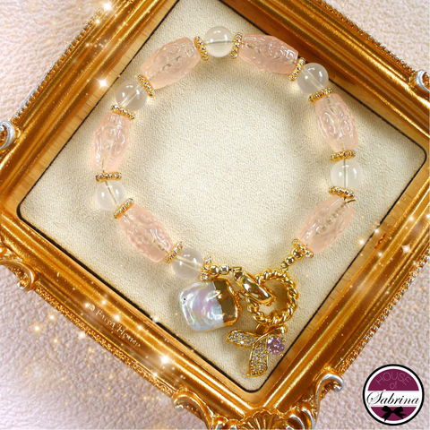 Rose Quartz Lucky Turn with dangling Freshwater Pearl Lucky Charm Bracelet