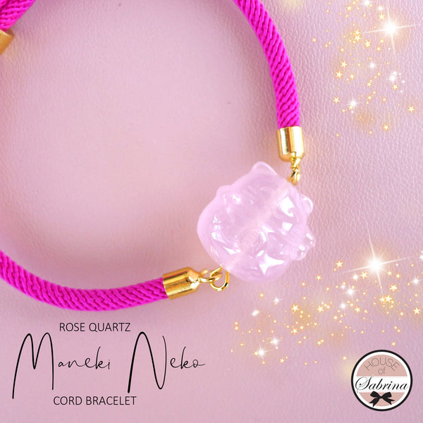 MANEKI NEKO ROSE QUARTZ STATEMENT CORD BRACELET